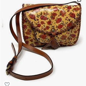 Patricia Nash leather flap crossbody purse.